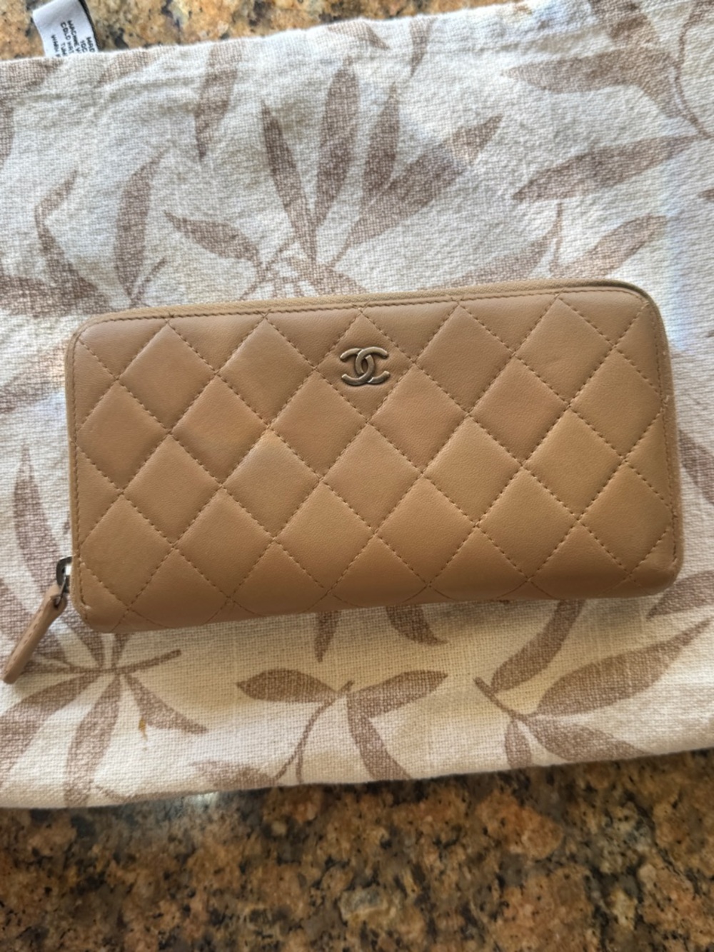 CHANEL Quilted Zip-Around Wallet in Taupe Beige